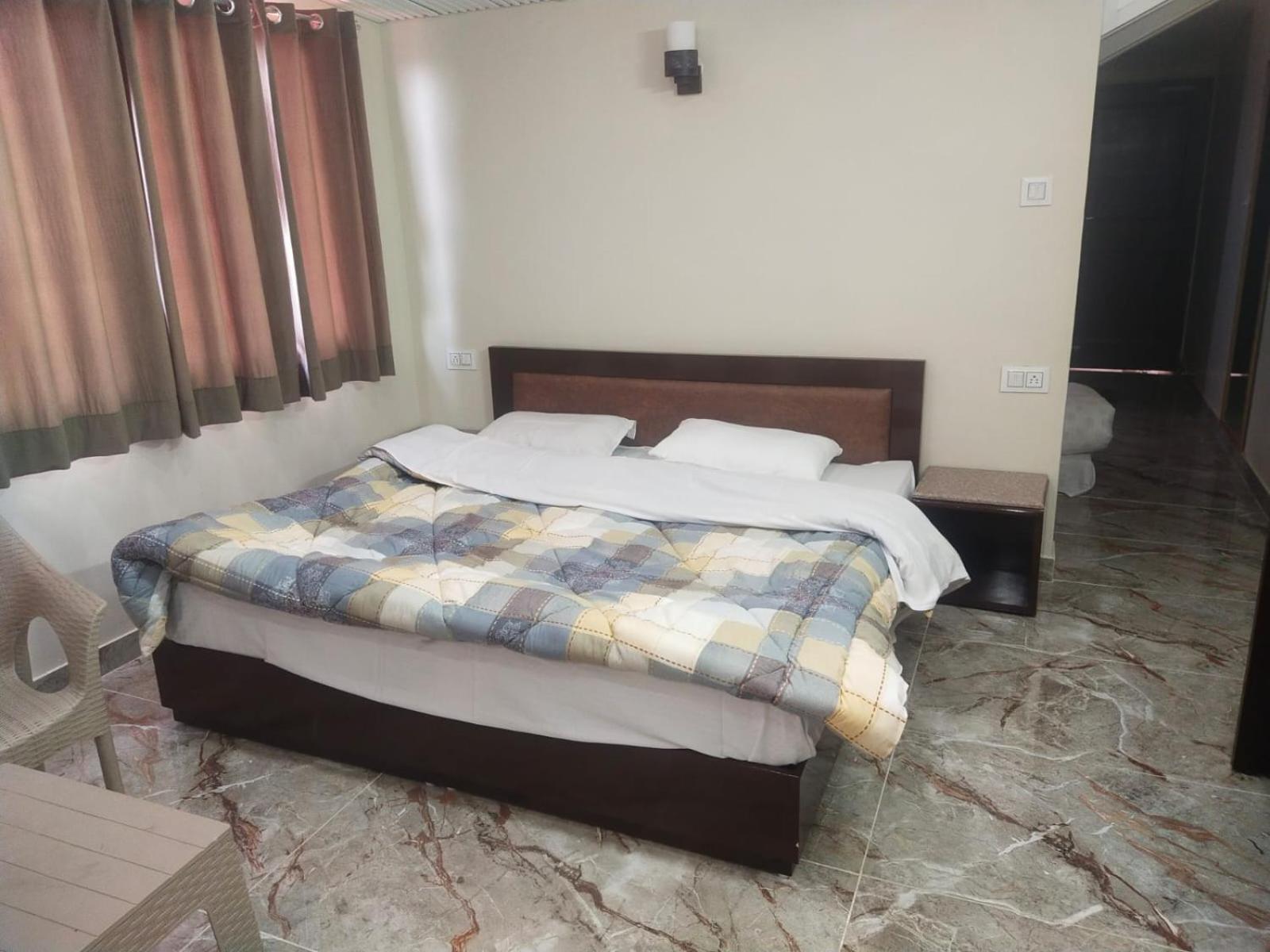 Dhanlaxmi Apartments Shimla Quarto foto